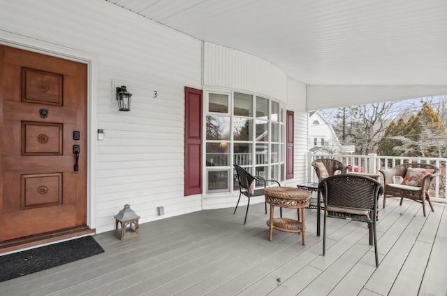 wooden deck featuring a porch