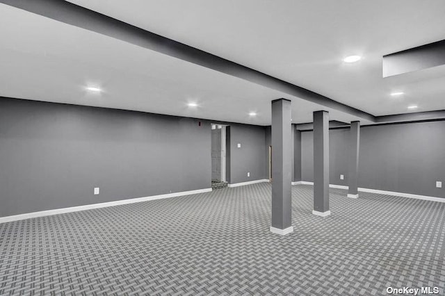 basement featuring carpet flooring