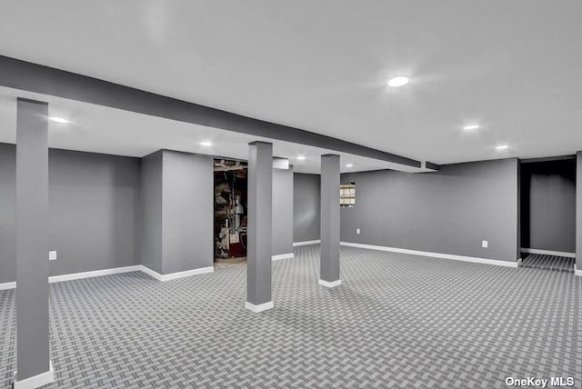 basement with carpet flooring