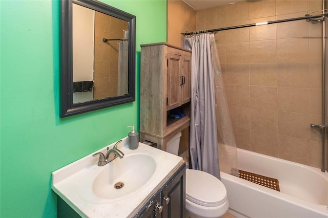 full bathroom featuring vanity, shower / bath combination with curtain, and toilet