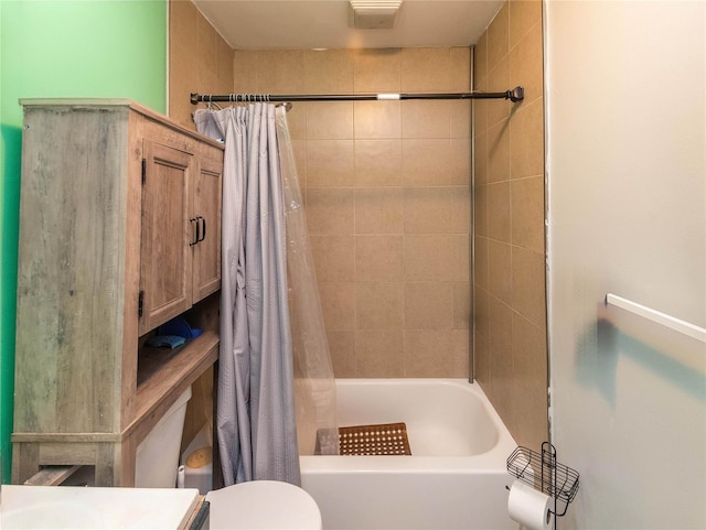 full bathroom with vanity, toilet, and shower / bathtub combination with curtain