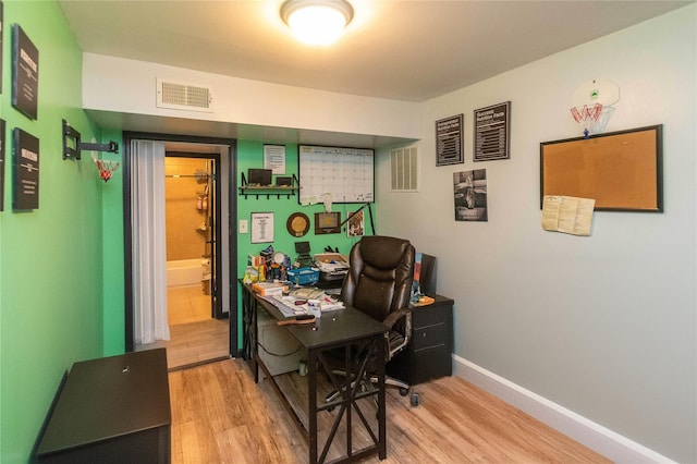 home office featuring wood-type flooring