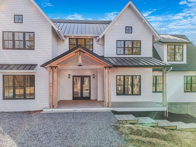 back of house featuring french doors