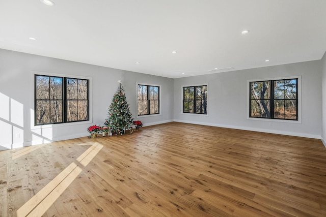 unfurnished living room featuring light hardwood / wood-style floors