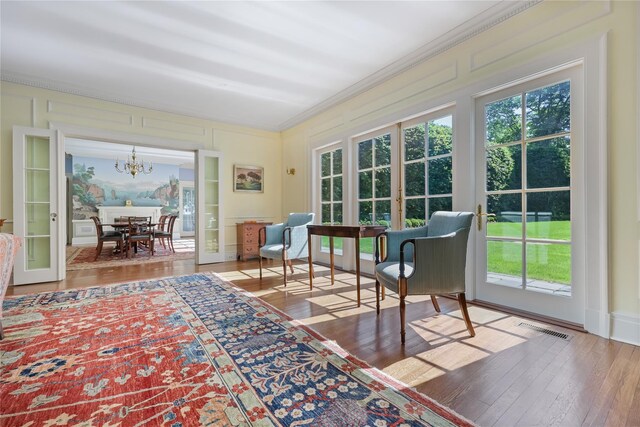36 Revolutionary Rd, Briarcliff Manor, NY 10510 - sunroom with healthy amount of natural light and a chandelier