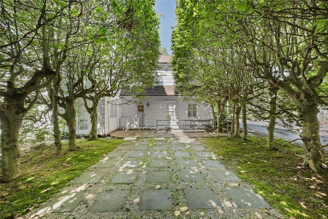 36 Revolutionary Rd, Briarcliff Manor, NY 10510 - back of property featuring a shingled roof