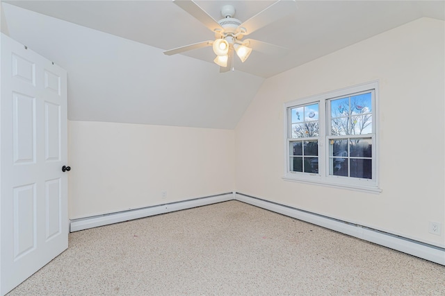 additional living space featuring ceiling fan and lofted ceiling