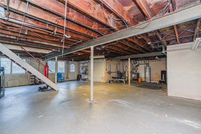 basement featuring gas water heater