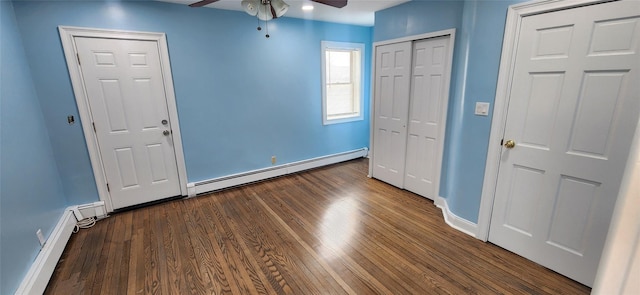 unfurnished bedroom with ceiling fan, hardwood / wood-style floors, and a baseboard radiator