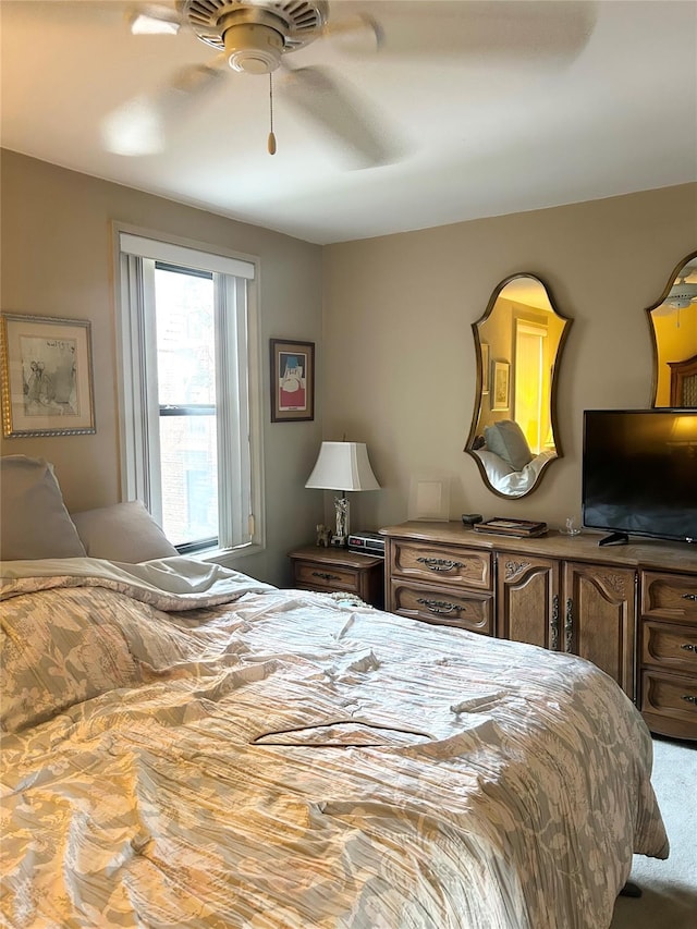 bedroom featuring carpet and ceiling fan