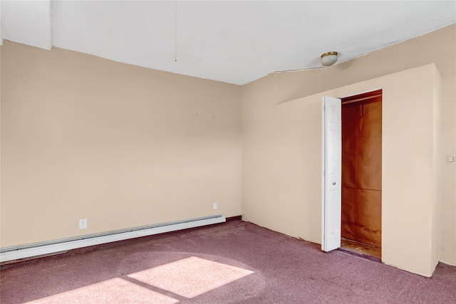 unfurnished room featuring carpet floors and a baseboard radiator