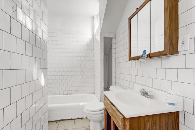 bathroom featuring tile patterned flooring, vanity, tile walls, and toilet