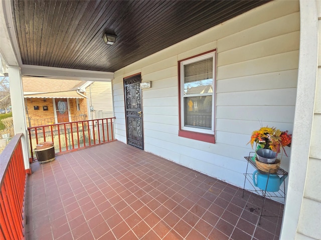 view of patio featuring a porch