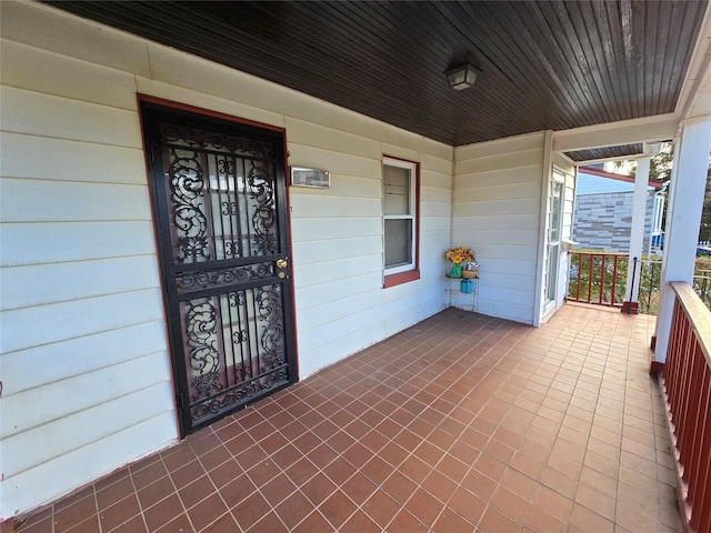 view of patio featuring a porch