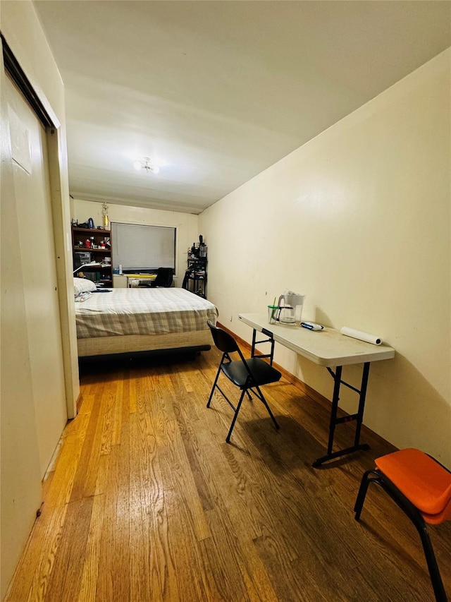 bedroom featuring light wood-type flooring