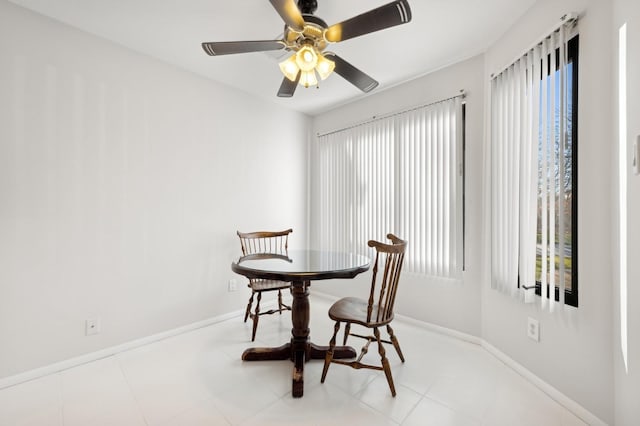 dining area with ceiling fan