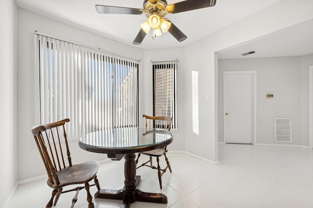 dining area with ceiling fan