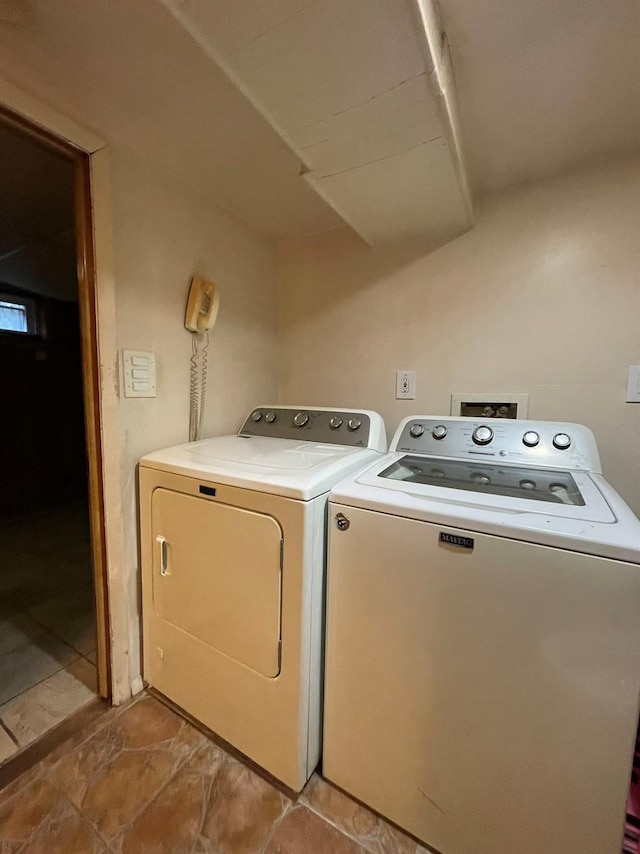 laundry area featuring washer and clothes dryer