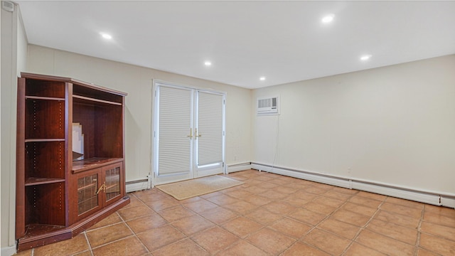 unfurnished living room featuring a wall mounted air conditioner and a baseboard heating unit