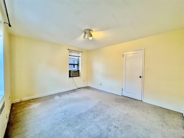 carpeted empty room featuring cooling unit