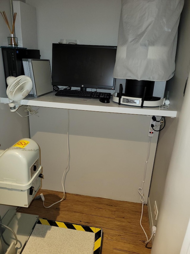 home office featuring hardwood / wood-style flooring