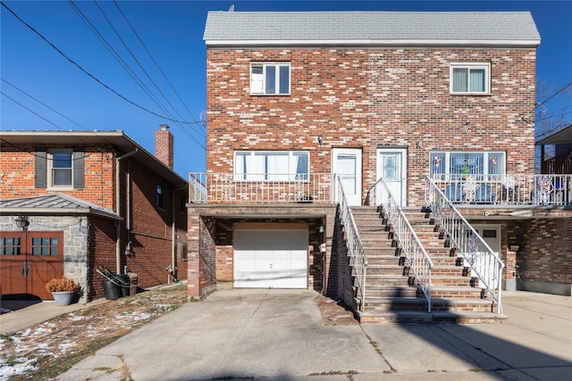 multi unit property featuring a garage