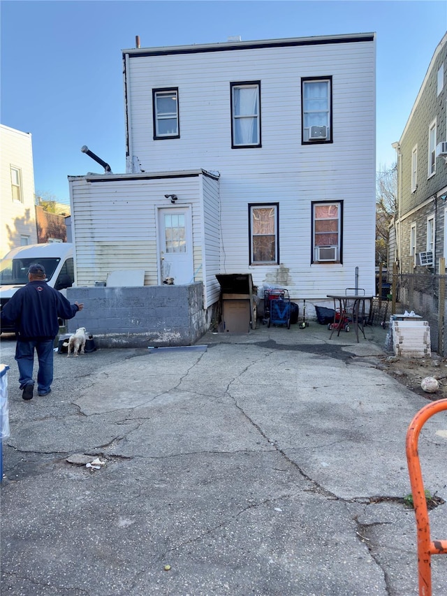 back of house with a patio area