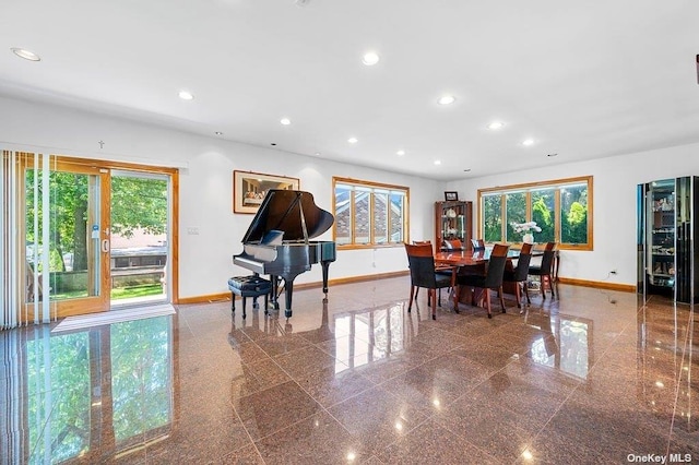 dining room with plenty of natural light