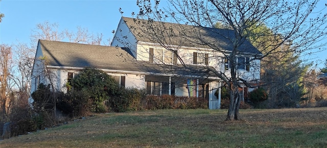 view of front of home with a front yard