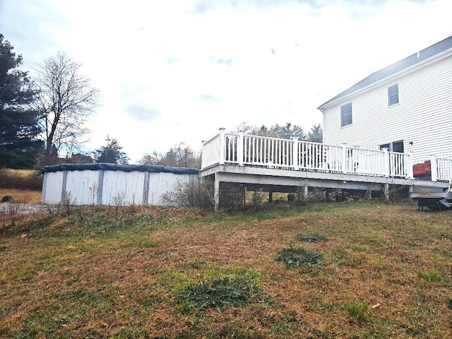 view of yard with a wooden deck