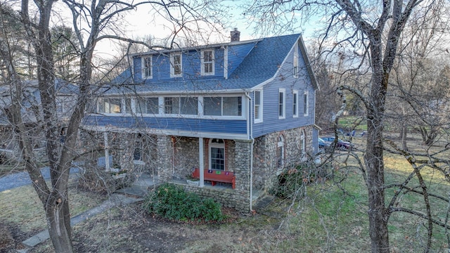 exterior space featuring a sunroom