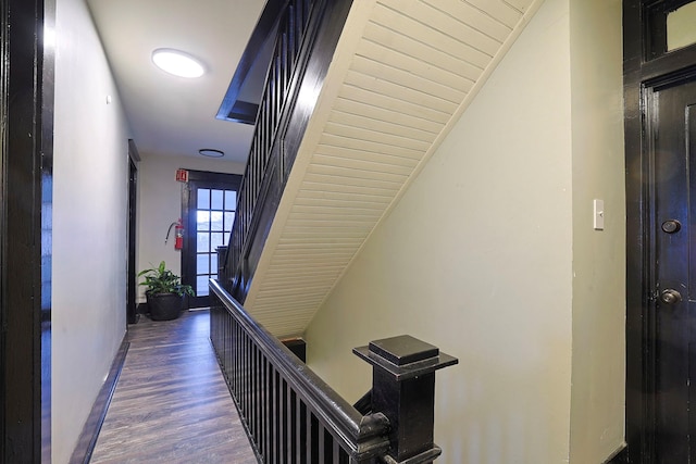 corridor featuring dark hardwood / wood-style floors