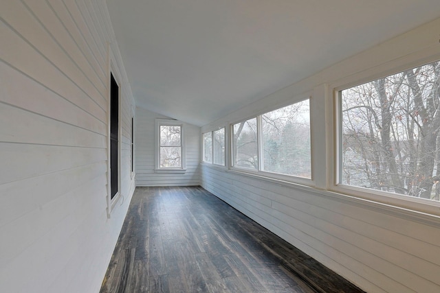 unfurnished sunroom featuring lofted ceiling