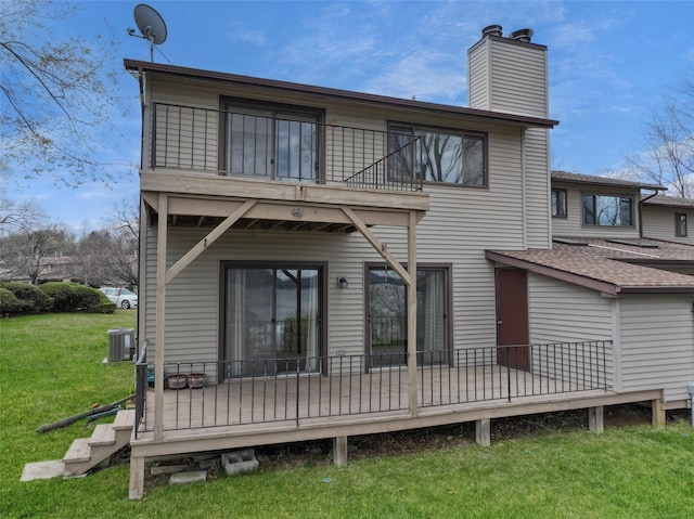 528 Barberry Ln, New Windsor, NY 12553 - rear view of house featuring a chimney, a balcony, a yard, and central AC unit