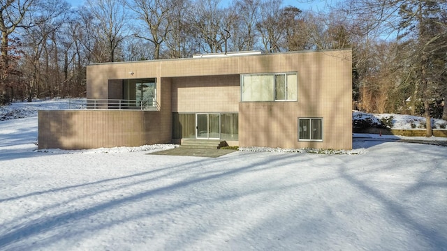 view of snow covered property