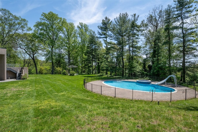 3 Paddock Ct, Old Westbury, NY 11568 - view of swimming pool with a water slide, stairs, and an in-ground hot tub