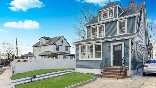 view of front of house with a front yard