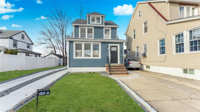 view of front facade featuring a front yard