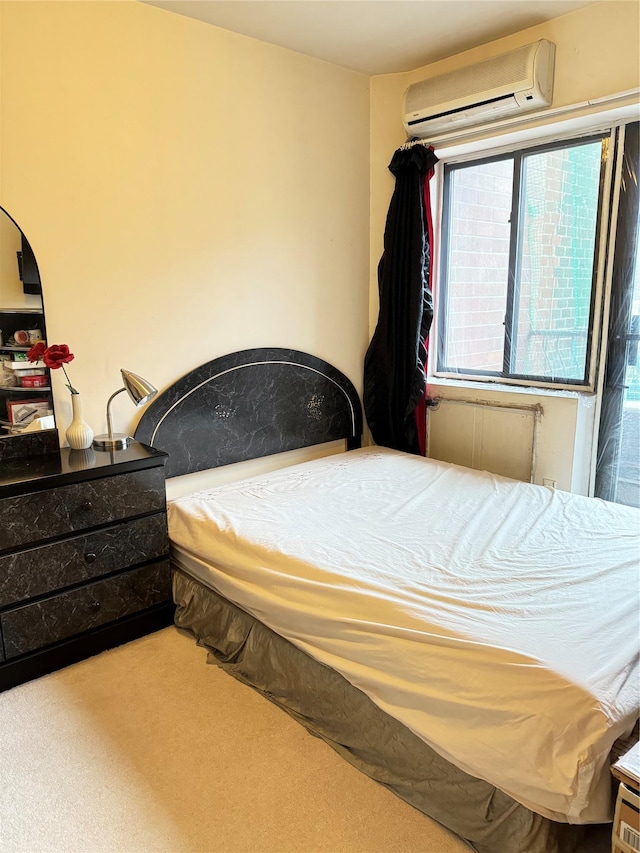 carpeted bedroom featuring a wall unit AC