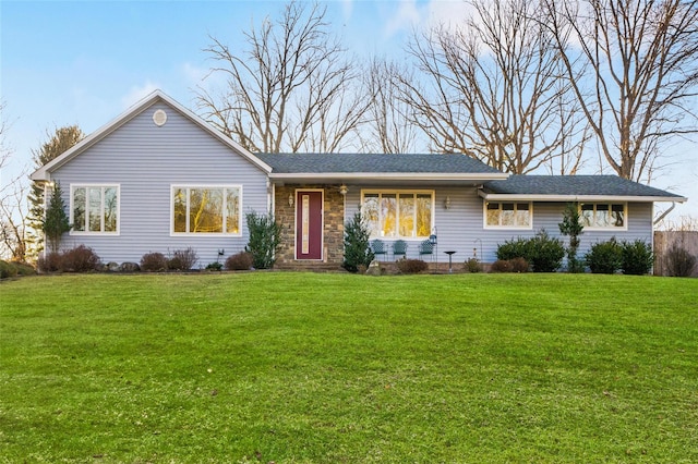 ranch-style home with a front yard