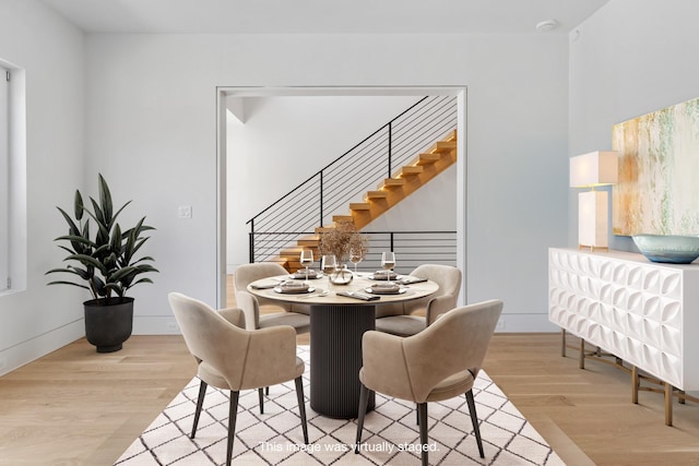 dining area featuring light hardwood / wood-style flooring