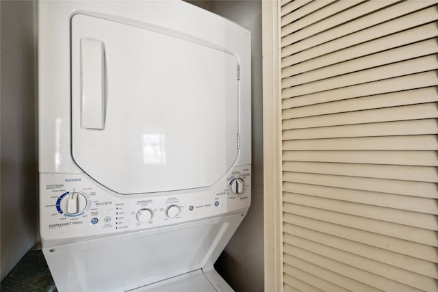 laundry room featuring stacked washer and dryer