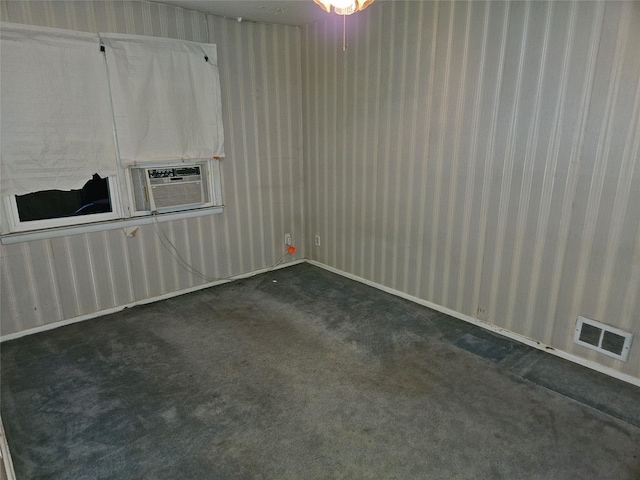 carpeted empty room featuring cooling unit