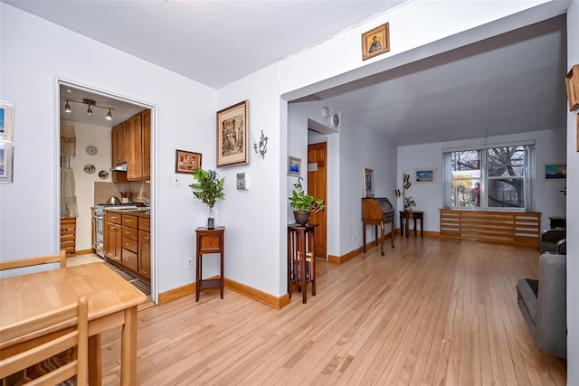 corridor featuring light hardwood / wood-style flooring