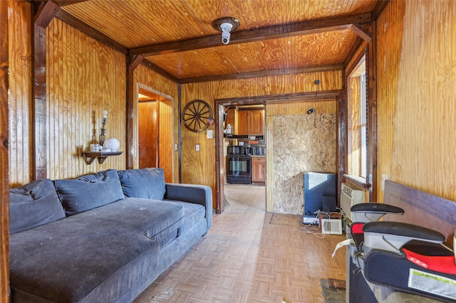 living room with wood walls, beamed ceiling, parquet floors, and wood ceiling