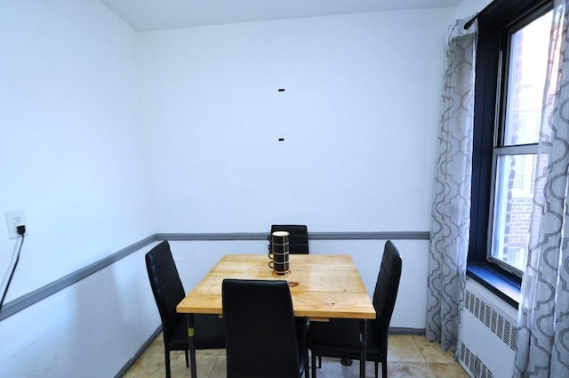 dining area with radiator