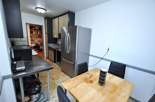 kitchen with stainless steel refrigerator