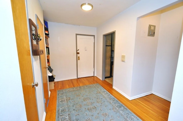 corridor featuring light wood-type flooring