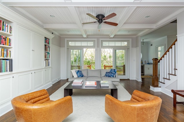 living room featuring beam ceiling, ceiling fan, dark wood-type flooring, and coffered ceiling