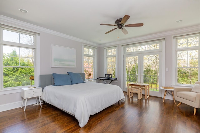 bedroom with crown molding, ceiling fan, and dark wood-type flooring